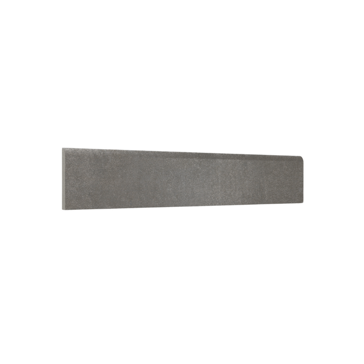 Guardapolvo Cerámica 8x45cm Cemento Grafito - vista del material