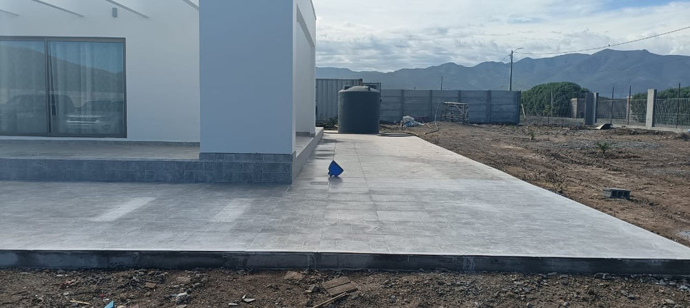 Obra de cliente: Rapolano Stone 56x56 en terraza - La Casa de la Cerámica