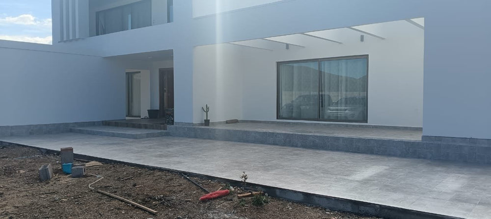 Obra de cliente: Rapolano Stone 56x56 en terraza - La Casa de la Cerámica