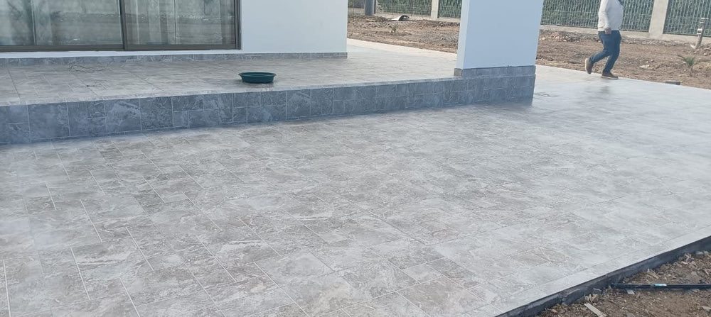 Obra de cliente: Rapolano Stone 56x56 en terraza - La Casa de la Cerámica